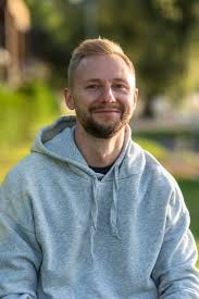 Justin K.